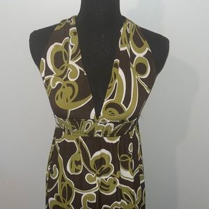 This is a small never worn dress. Has very stretchy material.